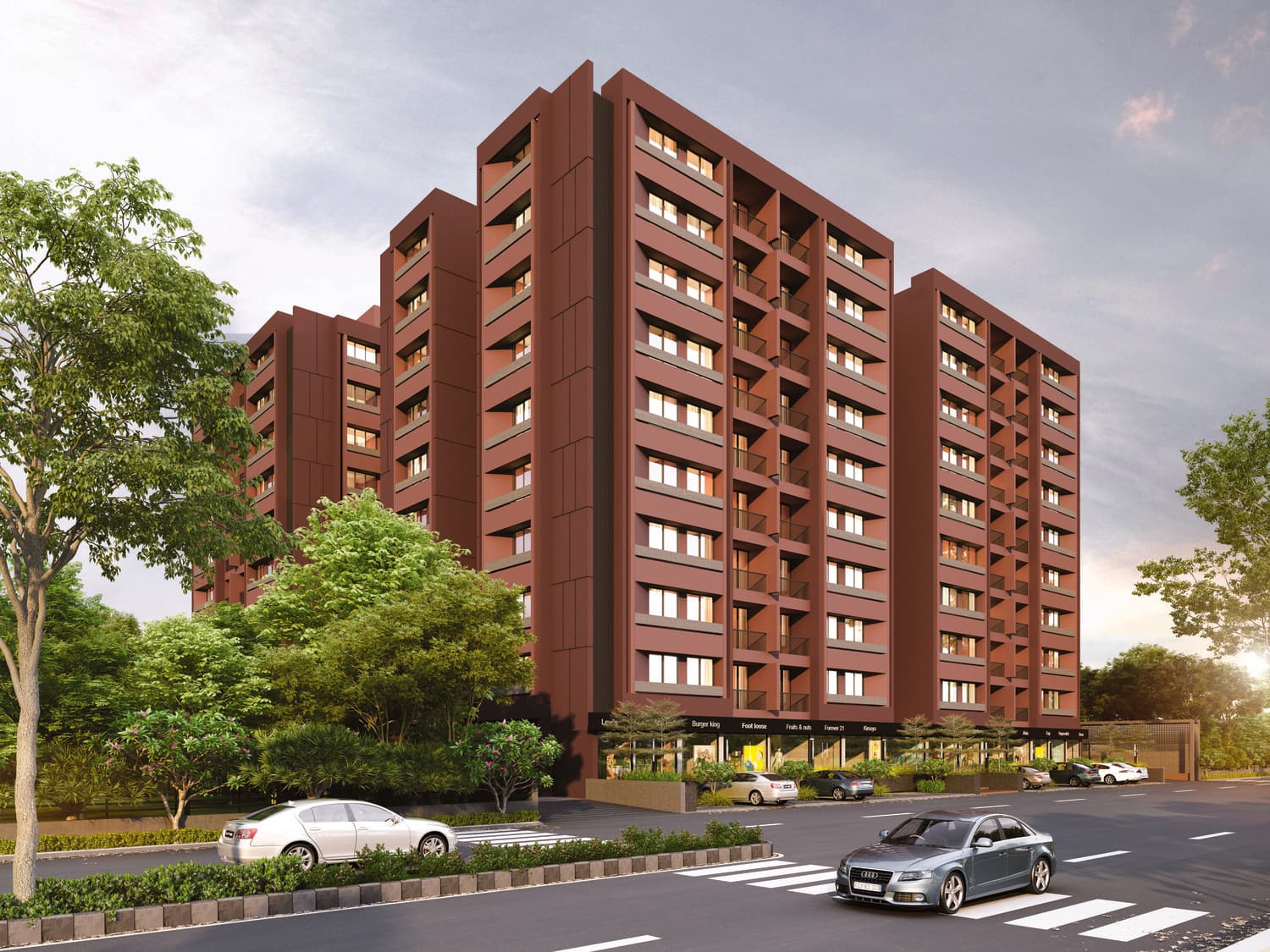 Corner view showing the terracotta and grey facade treatment