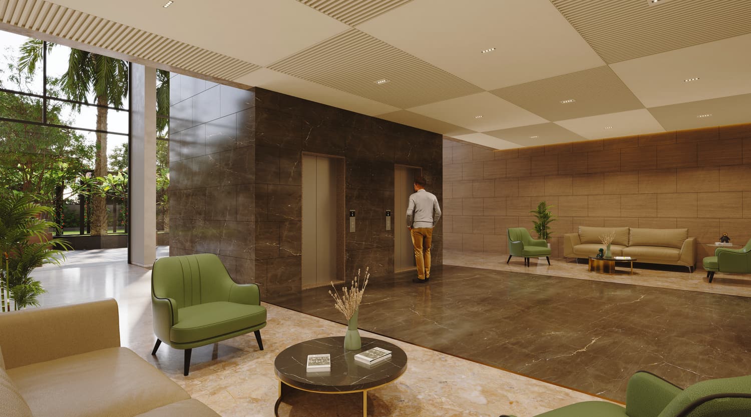 The residents lobby, finished in stone with lounge seating