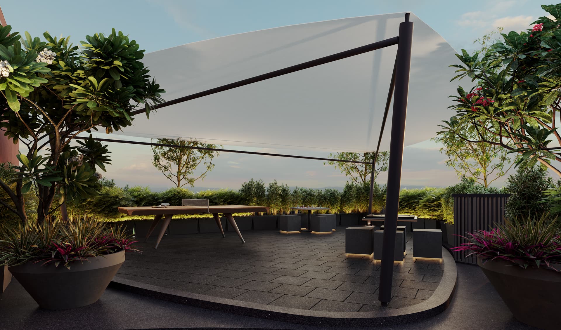 Open sky seating deck with a tensile canopy and long communal table
