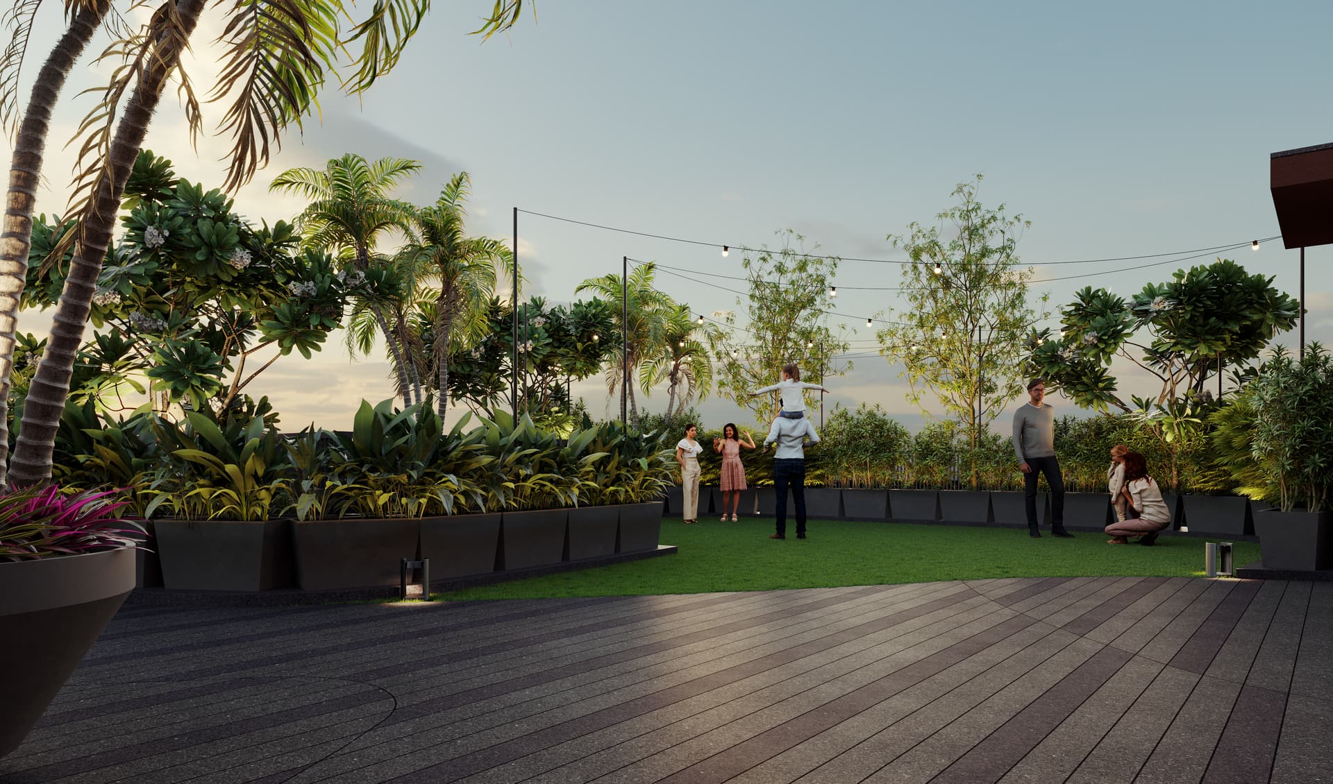 Residents gathered on the open lawn deck at golden hour